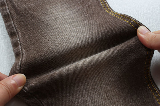 سعر جيد نسيج جينز براون سوبر براون للنساء رجل جينز منخفض السطح سعر تنافسي من الصين مدينة فوشان الانترنت